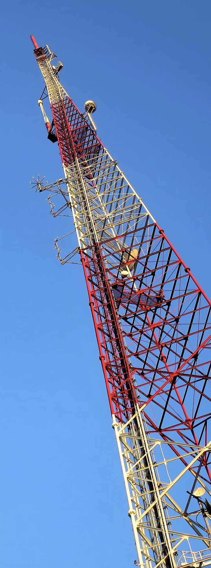 Image of One Tower against a blue sky.